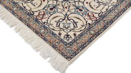 Backside of handmade 1980s Nain rug showing knot structure and weave density