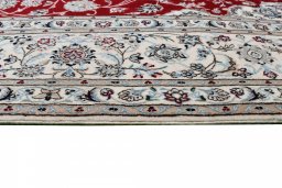 Corner detail of New Nain rug showing border pattern and Cork pile