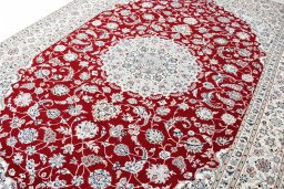 Backside of handmade New Nain rug showing knot structure and weave density