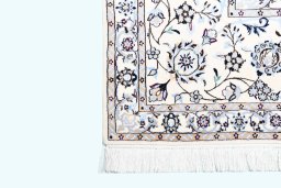 Corner detail of New Nain rug showing border pattern and Cork pile