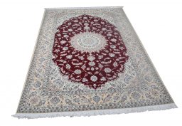 Corner detail of New Nain rug showing border pattern and Cork pile
