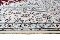 Corner detail of New Nain rug showing border pattern and Wool pile