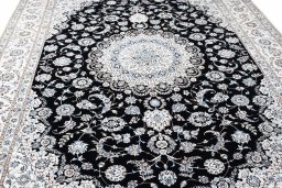 Corner detail of New Nain rug showing border pattern and Wool pile