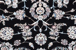 Close-up detail of New Nain rug from Iran / Persia showing Wool weave