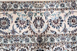 Central medallion detail of New Nain rug from Iran / Persia