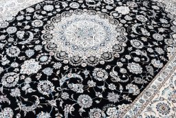 Close-up detail of New Nain rug from Iran / Persia showing Wool weave