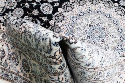 Close-up detail of New Nain rug from Iran / Persia showing Wool weave
