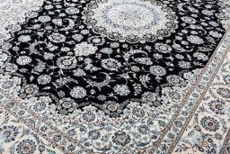 Close-up detail of New Nain rug from Iran / Persia showing Wool weave