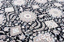 Corner detail of New Nain rug showing border pattern and Cork pile