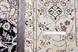 Corner detail of New Nain rug showing border pattern and Cork pile