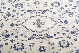 Central medallion detail of 2000s Nain rug from Iran / Persia