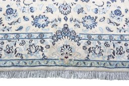 Close-up detail of 2000s Nain rug from Iran / Persia showing Wool weave