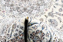 Close-up detail of New Nain rug from Iran / Persia showing Wool weave