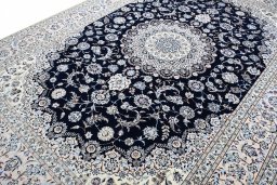 Corner detail of New Nain rug showing border pattern and Cork pile