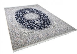 Corner detail of New Nain rug showing border pattern and Cork pile