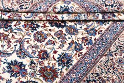 Corner detail of 1930s Nain rug showing border pattern and Wool pile