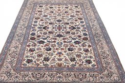 Surface texture of 1930s Nain rug with natural Wool and intricate pattern