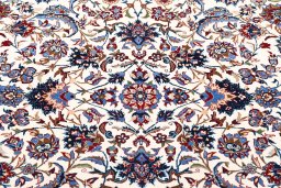 Backside of handmade 1930s Nain rug showing knot structure and weave density