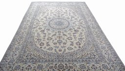 Surface texture of New Nain rug with natural Wool and intricate pattern