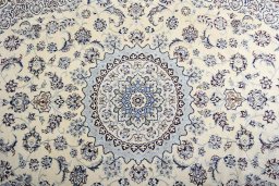 Central medallion detail of New Nain rug from Iran / Persia