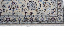 Close-up detail of New Nain rug from Iran / Persia showing Wool weave