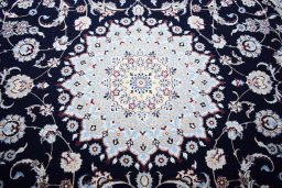 Central medallion detail of New Nain rug from Iran / Persia