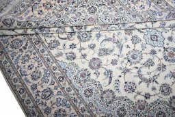 Central medallion detail of New Nain rug from Iran / Persia