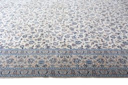Corner detail of 1970s Nain rug showing border pattern and Cork pile