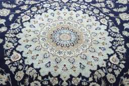 Central medallion detail of New Nain rug from Iran / Persia