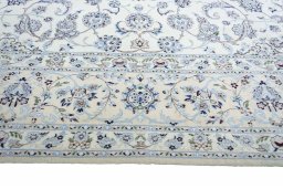Corner detail of New Nain rug showing border pattern and Cork pile