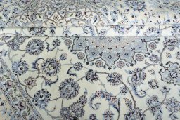 Close-up detail of New Nain rug from Iran / Persia showing Cork weave