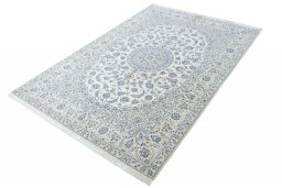 Corner detail of New Nain rug showing border pattern and Cork pile