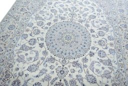 Backside of handmade New Nain rug showing knot structure and weave density