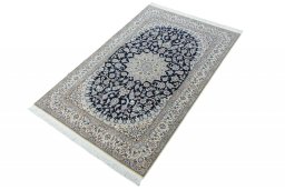 Corner detail of New Nain rug showing border pattern and Cork pile