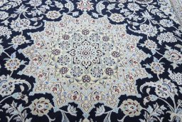 Central medallion detail of New Nain rug from Iran / Persia