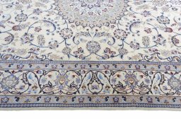 Corner detail of New Nain rug showing border pattern and Cork pile