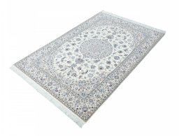 Corner detail of New Nain rug showing border pattern and Cork pile