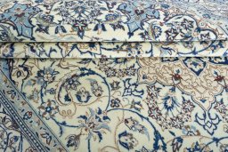 Close-up detail of New Nain rug from Iran / Persia showing Wool weave