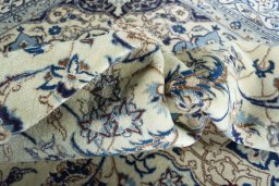 Surface texture of New Nain rug with natural Wool and intricate pattern