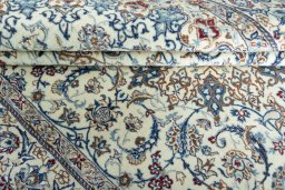 Close-up detail of New Nain rug from Iran / Persia showing Cork weave