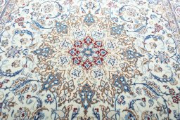 Central medallion detail of New Nain rug from Iran / Persia