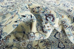 Surface texture of New Nain rug with natural Wool and intricate pattern