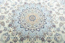 Central medallion detail of New Nain rug from Iran / Persia