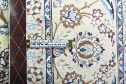 Surface texture of New Nain rug with natural Cork and intricate pattern