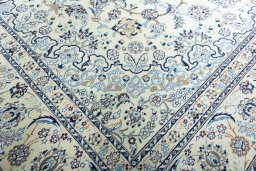 Central medallion detail of New Nain rug from Iran / Persia