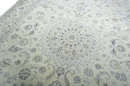 Backside of handmade New Nain rug showing knot structure and weave density