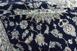 Close-up detail of New Nain rug from Iran / Persia showing Wool weave