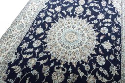 Central medallion detail of New Nain rug from Iran / Persia
