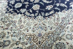 Close-up detail of New Nain rug from Iran / Persia showing Wool weave