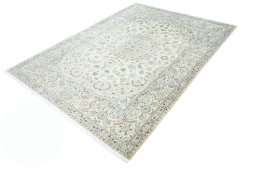 Corner detail of 2000s Nain rug showing border pattern and Wool pile